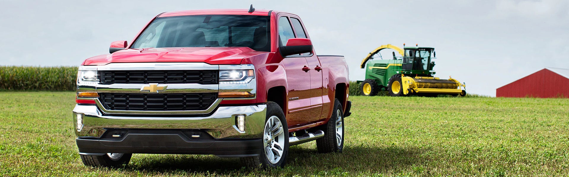 Red 2017 Chevy Silverado 1500 at farm