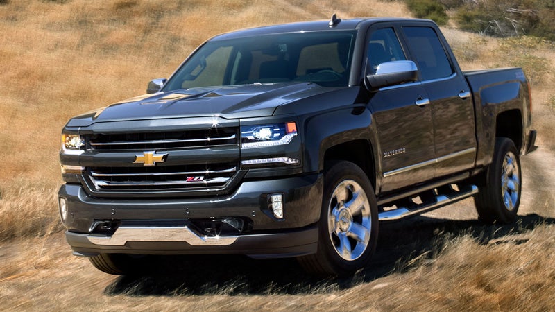 Black 2017 Chevy Silverado 1500 in field